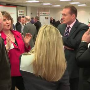 People discussing at the 2012 Housing Technology Conference