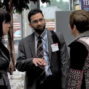 People discussing at the 2011 Housing Technology Conference