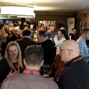 Crowd of people networking at Housing Technology 2020 drinks reception