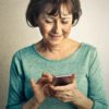 woman looking at her phone